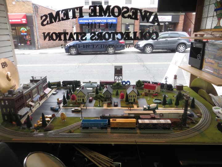 A train display inside the storefront at 229 Harrison Ave. 