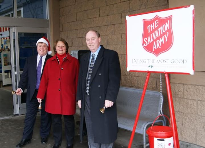 From left, Reps. Dan Carter and Jan Giegler and Sen. Michael McLachlan volunteer as bell ringers for the Salvation Army outside the Wal-Mart in Danbury. 