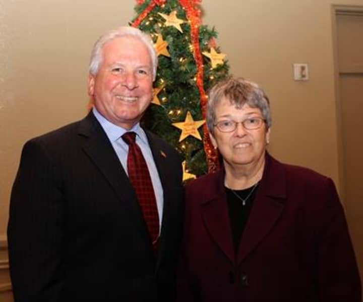William F. Flooks, Jr., Beecher Flooks Funeral Home, Inc., HPCW Board Chairman with HPCW Executive Director Mary K. Spengler. 