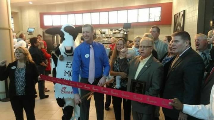 Rich Beattie, 33, center, is the first-time business owner behind the new Chick-Fil-A franchise at the Danbury Fair mall.