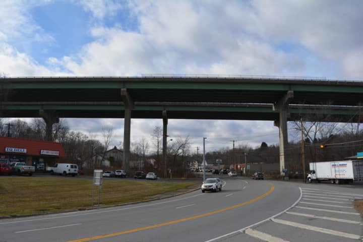 Details are emerging about a woman who apparently jumped from an I-84 overpass on Tuesday. 