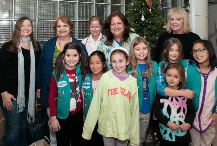 Girl Scouts from Weston Troop No. 50323 donated toys and other gifts to Norwalk Hospital&#x27;s pediatric unit.