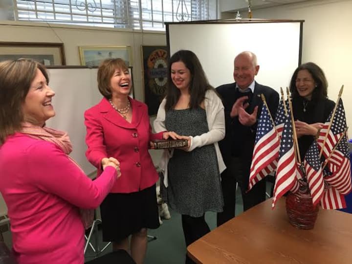 Lisa Wexler, second from left, is sworn into office. With her are her daughter, Joanna Wexler, Rep. Gail Lavielle, and Westport First Selectman James Marpe.