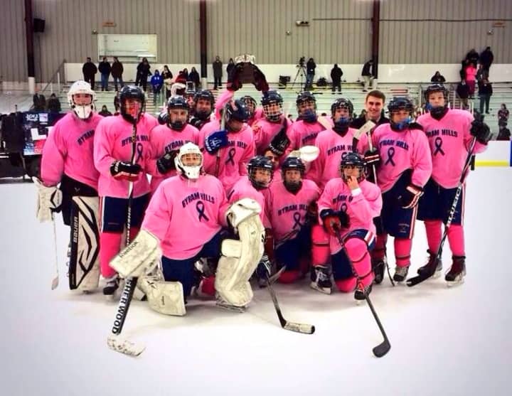 The Byram Hills hockey team wearing their pink jerseys. 