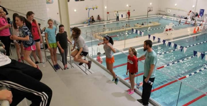 Water Rats prep for this weekend&#x27;s swim meet with a &quot;dry-land&quot; training session in the Cameron Bruce Observation Gallery at the Westport Weston Family YMCA.