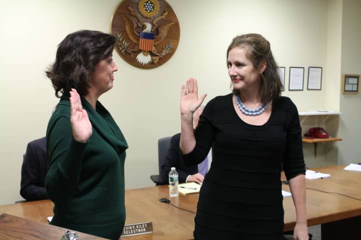 Sheila Mamion (right) is sworn in by Fairfield&#x27;s Town Clerk at the Thursday, Jan. 8, Board of Selectmen meeting.