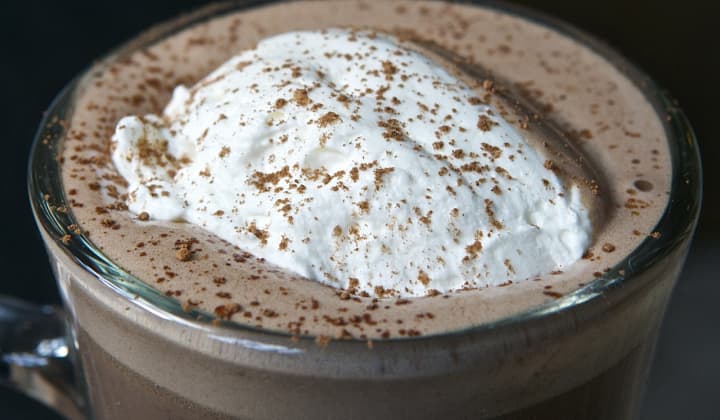 The hot chocolate from Chocopologie includes fresh whipped cream and shaved chocolate.