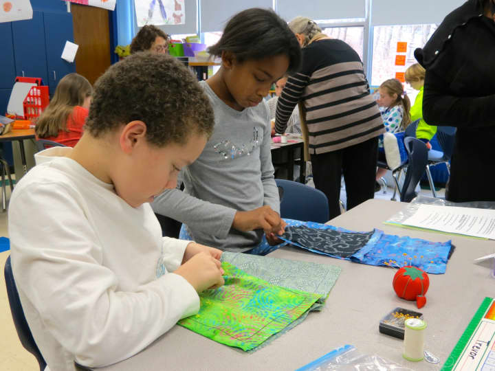 Croton-Harmon fourth-graders sewed Colonial-style four square pillows as an introduction to a unit about early American history.