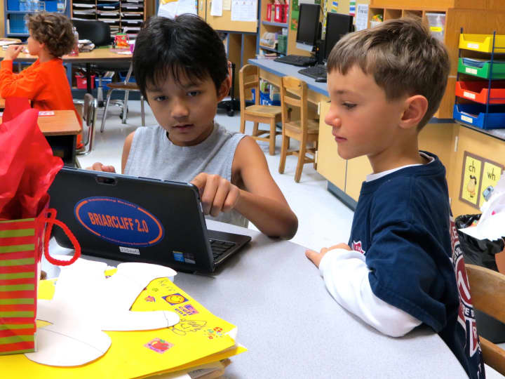 Todd Elementary School fourth-grade students taught first-graders how to play Cool Math games using individual presentations on their personal devices.