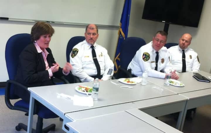 Special Agent in Charge of the FBI in Connecticut Patricia Ferrick speaks during the &quot;Lunch With The Chief&quot; at the New Canaan Police Department. Also pictured from left are: Capt. Vincent Demaio, Chief Leon Krolikowski and Capt. John DiFederico.