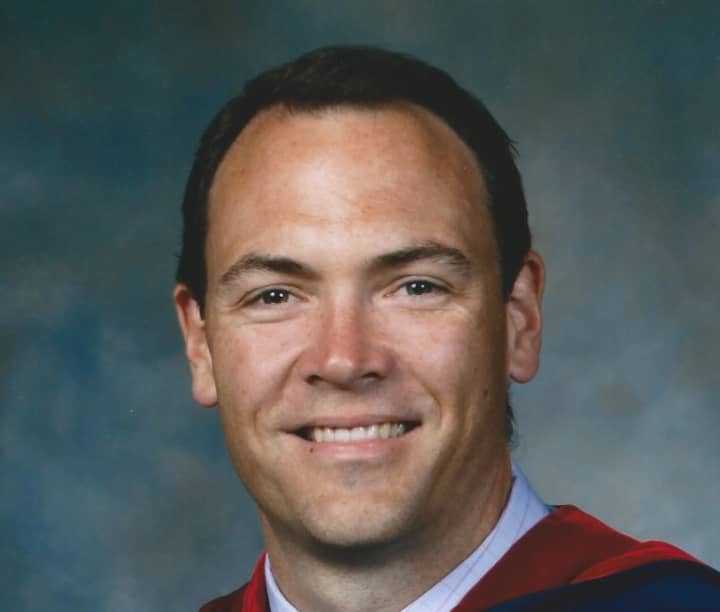 Dr, Mark J. Fletcher