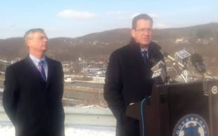 Transportation Commissioner James Redeker and Gov. Dannel Malloy sell their transportation initiative from the rest area at Exit 2 of I-84 in Danbury on Thursday morning. 