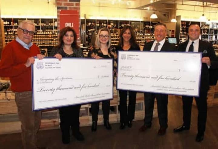 Don Zacharia, Chairman of Zachys Wine &amp; Liquor, Cheryl and David Bunzel of JDRF, Tara Lee, JDRF NYC Development Manager, Betty Crea, Executive Director of Navigating the Spectrum, and Ronnie Arafieg of Scarsdale PBA.