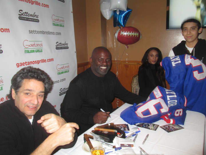 More than 150 people came out to meet Lawrence Taylor.
