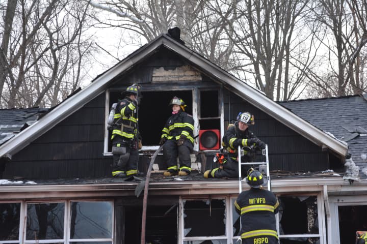 Firefighters respond to a residential blaze in Mahopac Falls.