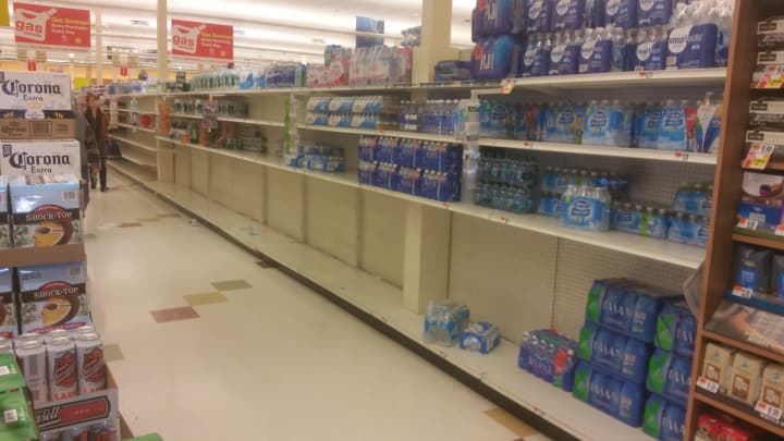 Many of the aisles Monday, Jan. 26, at the Stop &amp; Shop on Kings Highway Cutoff, were almost empty, like the shelves that hold bottle water.