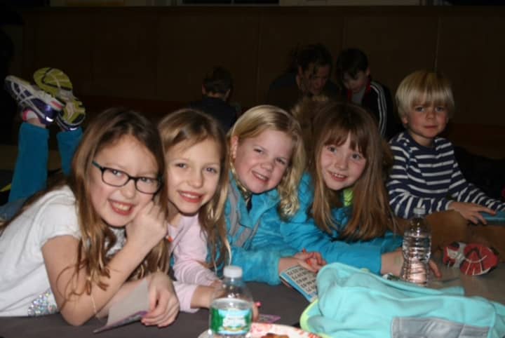 Talia Azous, Sophia Wood, Gillian Prichard, Katie Coward and Matthew Prichard enjoy bingo night at Royle Elementary School.