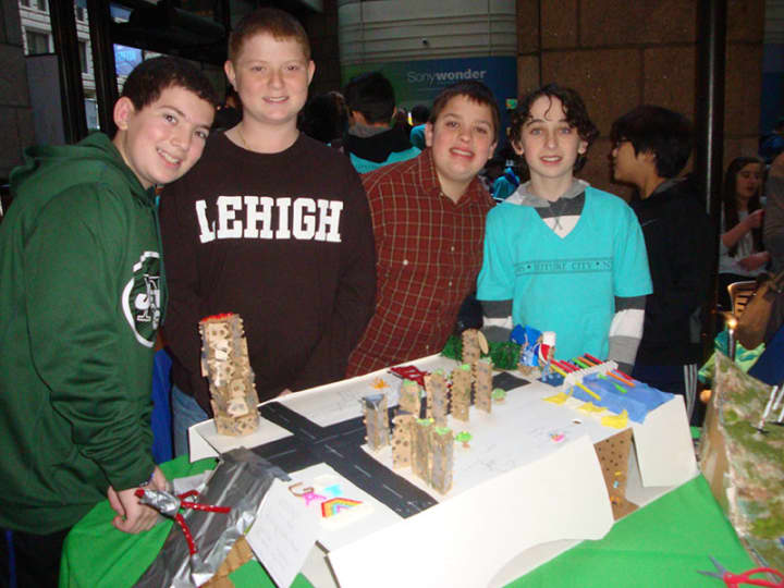 Briarcliff Middle School eighth-grade Future City Club team members (from left) Ben Harris, Josh Ross, Nick Sama and Max Hertz (Caleb Schumacher not pictured) with their award-winning model city, Goatlantis.