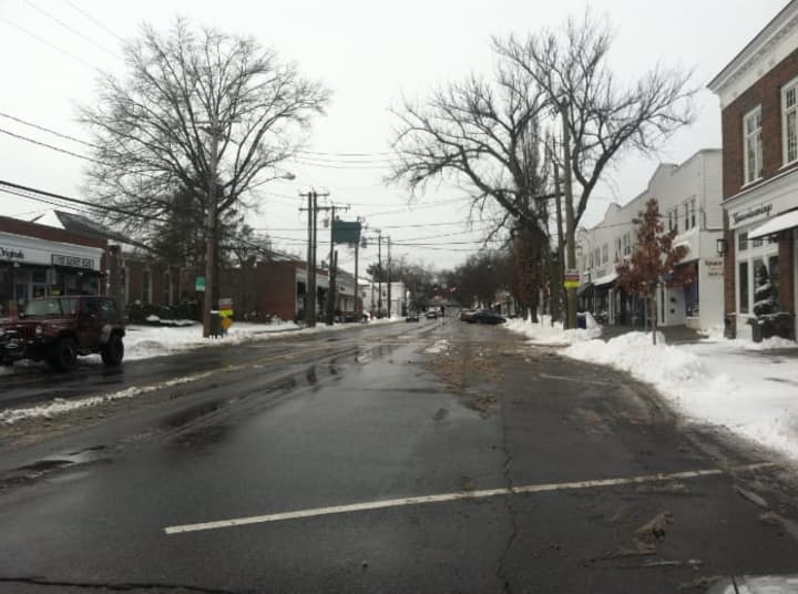 Sound Beach Avenue in Old Greenwich is nearly deserted Tuesday after stores closed in anticipation of a massive blizzard that never came.