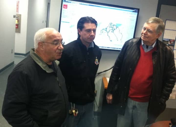 Mayor David Martin, right, listens as Ernie Orgera, left, Director of Operations, speaks Tuesday about the winter storm, In center is Tom Turk, traffic and road maintenance supervisor.