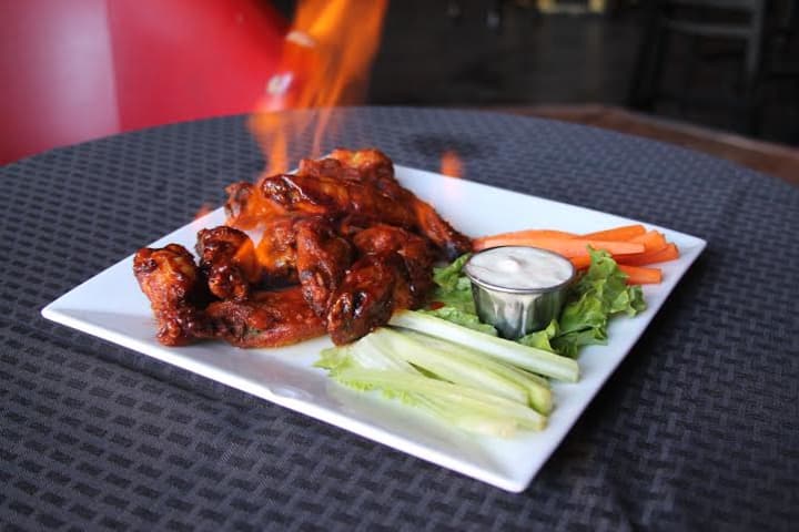 Wings are part of the game plan at Black Bear Sports Bar in White Plains.
