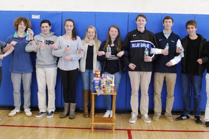 The Darien Youth Commission will attempt to break the Guinness World Record for longest arm-linked toast on Saturday.