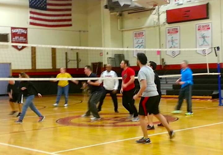 Alexander Hamilton teachers and district parents squared up for a volleyball match on Friday, Jan. 23.