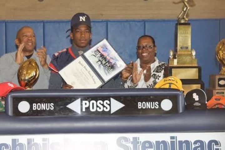 Brandon Coleman signs to attend the Naval Academy. The Archbishop Stepinac senior is joined by his parents. He lives in Yonkers.