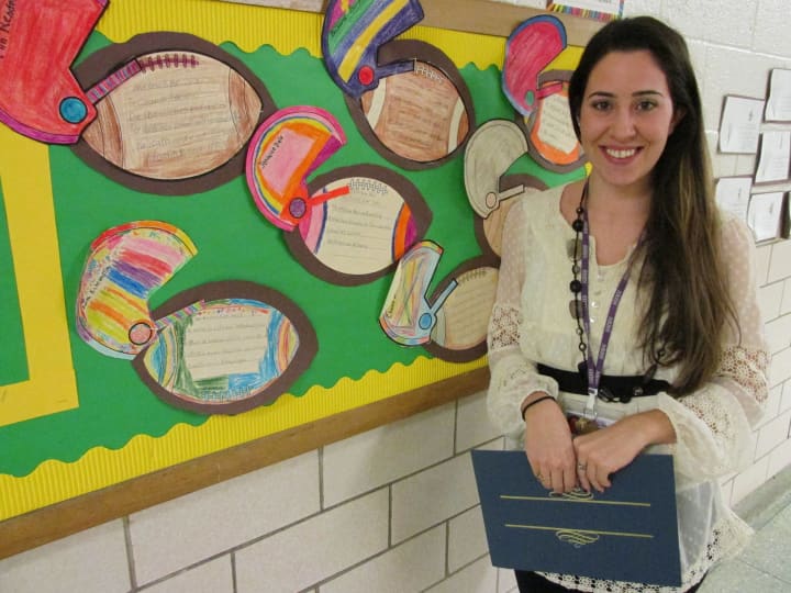 New Rochelle High School teacher Marianna Trombetta was recommended for tenure at a recent meeting. 