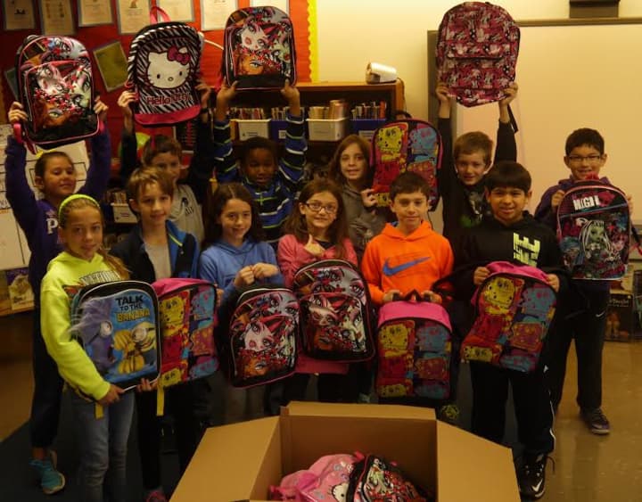 Meadow Pond Elementary School&#x27;s fourth-grade class stuffed backpacks for Adirondack Central School District.