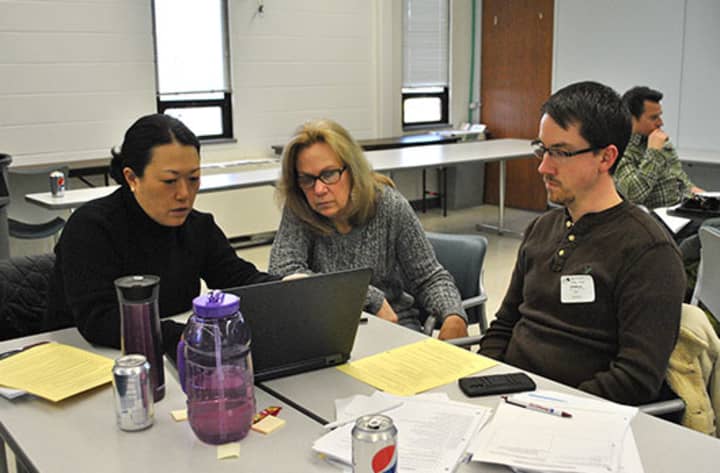 From left, Hendrick Hudson Central School District educators Tina Yu, Christina Guadagno and Barry Fuller participating in a Teaching Is Core workshop at Putnam/Northern Westchester BOCES on Jan. 21.