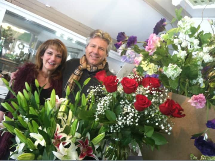Floral designers Debbie Valentine and Gregg Fisk said Valentine&#x27;s Day is one of the busiest of the year. They work at New Canaan Florist, Garden &amp; Gifts.