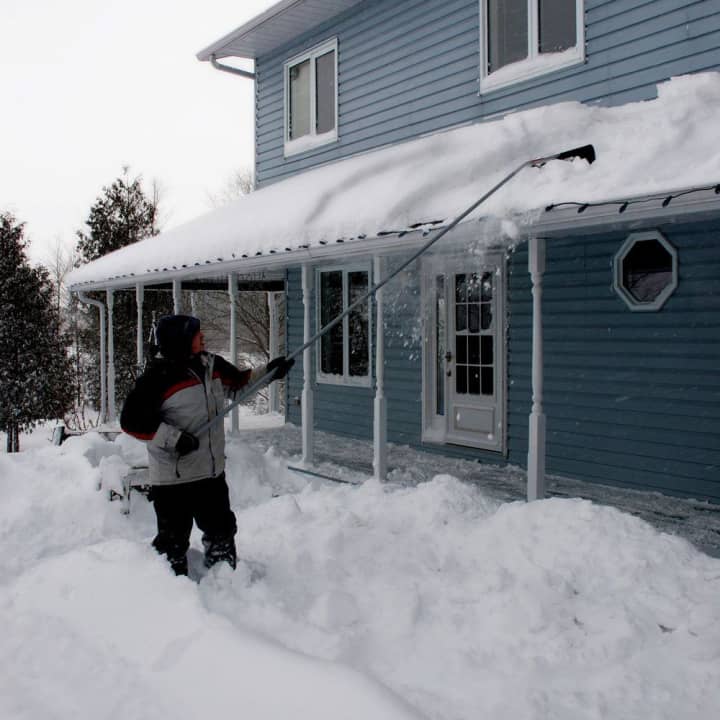 Connecticut Gov. Dannel P. Malloy encourages state residents to remove snow from their roofs. More snow is forecast for Saturday.