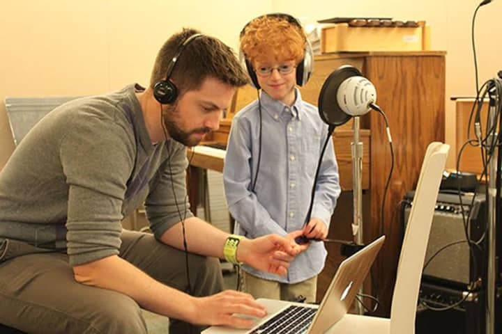 Music therapy student Matthew Welling with his teacher James Maxson.