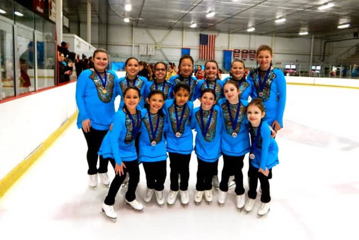 The Sprites won a gold medal for the Southern CT Synchronized Skating team. See story for IDs.