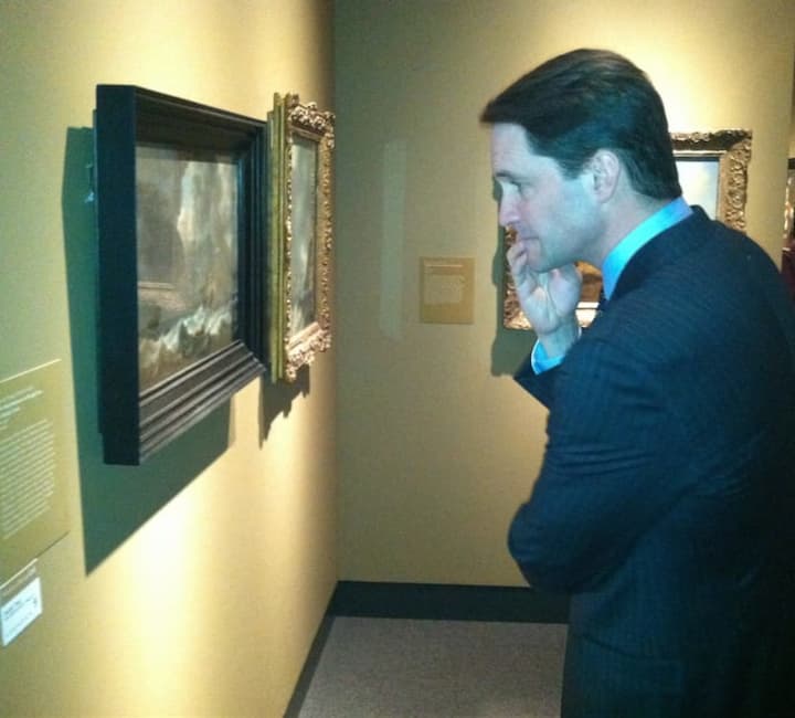 U.S. Rep. Jim Himes, D-Conn., a Cos Cob resident, looks at some of the art on display at the Bruce Museum on Wednesday.