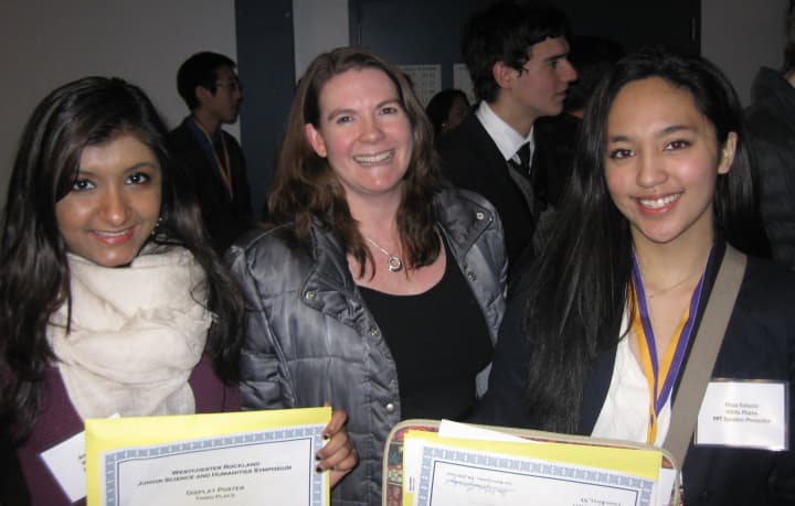 From left, Aneri Suthar, teacher Kimberly Fleming and Rizza Estacio.