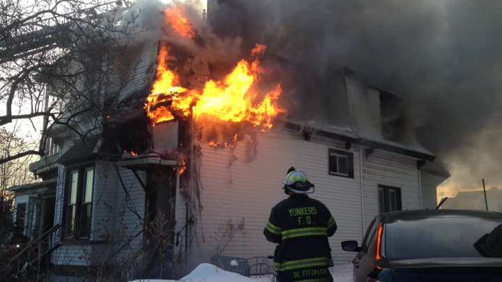 Firefighters encountered heavy flames when they arrived at the scene at 39 Locust Hill Ave. in Yonkers late Wednesday afternoon.