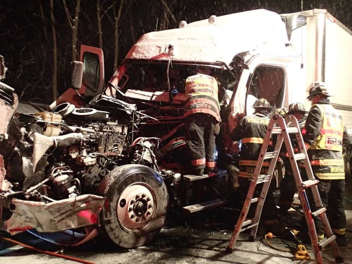 Westport firefighters extricated the driver of a tractor-trailer after a crash on I-95.