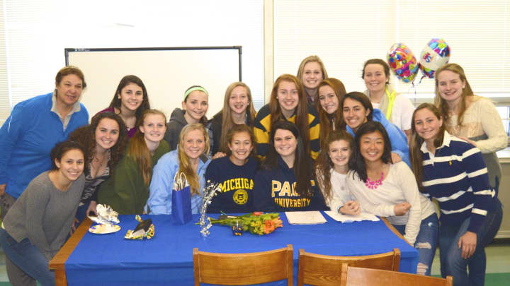 Sarah Bard takes a picture with Lakeland High teammates after signing a letter of intent to play field hockey at Pace University.