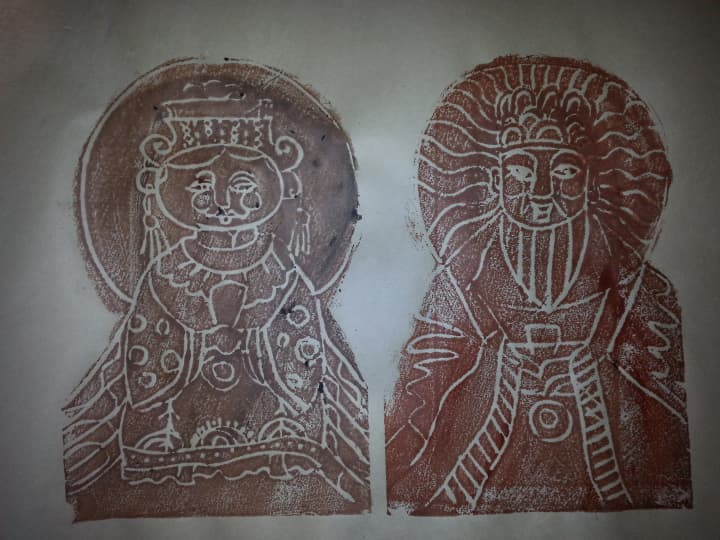 The Chinese Kitchen God and his wife, new block prints made each Chinese New Year.