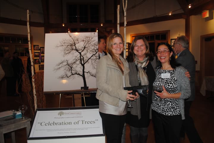 Pictured at last years reception are Andrea Bonfils, and Tree Conservancy of Darien board members Karen Hughan and Sabina Harris.