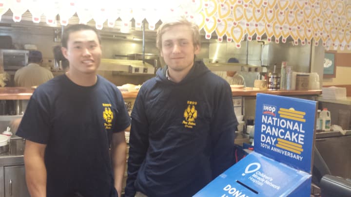Ryan Calmon, a Pace University sophomore, and Tyler Mittleman, a Pace freshman, volunteered to help raise money for Maria Fareri Children&#x27;s Hospital on Tuesday at the IHOP in Hartsdale.