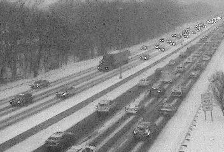 Traffic slow on a snow-covered I-95 on Tuesday afternoon. 