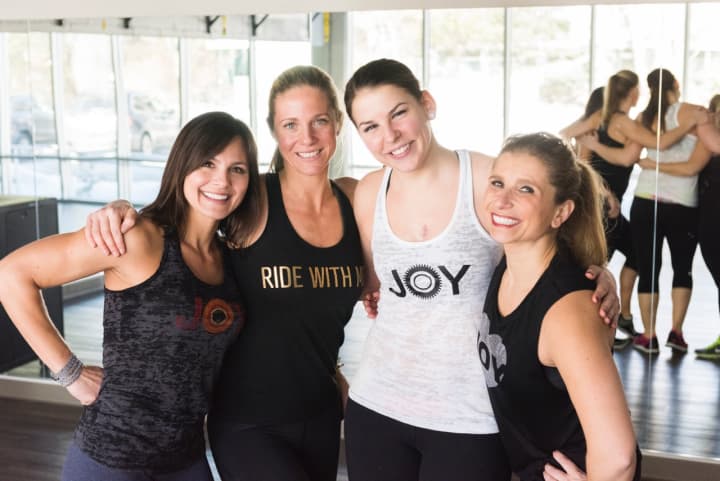 From left, JoyRide instructors Dina Fay, Mackenzie Pretty, Amy Tillotson and Anna Zapotosky in the Darien studio.