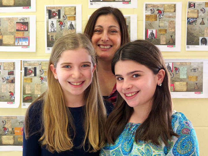 Todd Elementary School fourth-grade students Talia London, left, and Lauren Jacoby with their teacher Barbara Argentino.