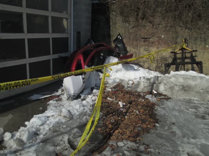 Two cars were damaged following a roof collapse at AAA Nolan&#x27;s Auto Collision in Ossining. 