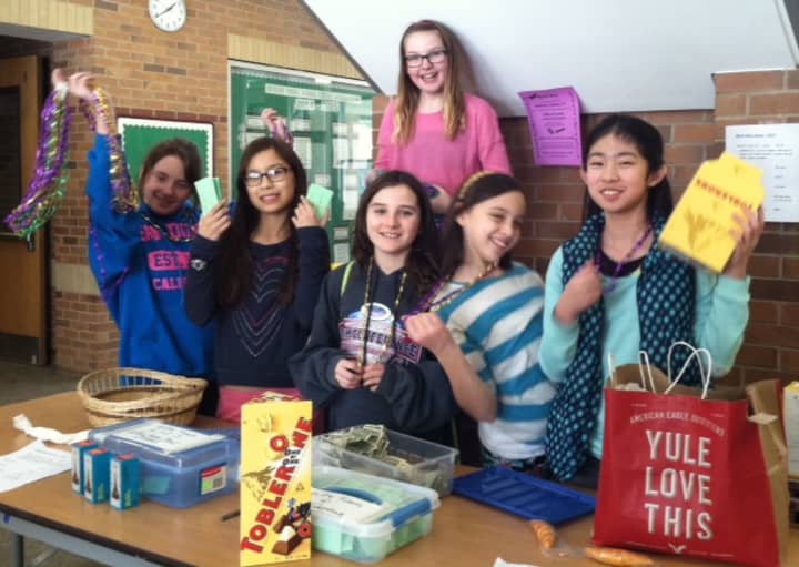 Irvington Middle School French Club students celebrated National French Week by engaging the school community in a number of cultural activities, which helped raise $5,000 for Doctors Without Borders.