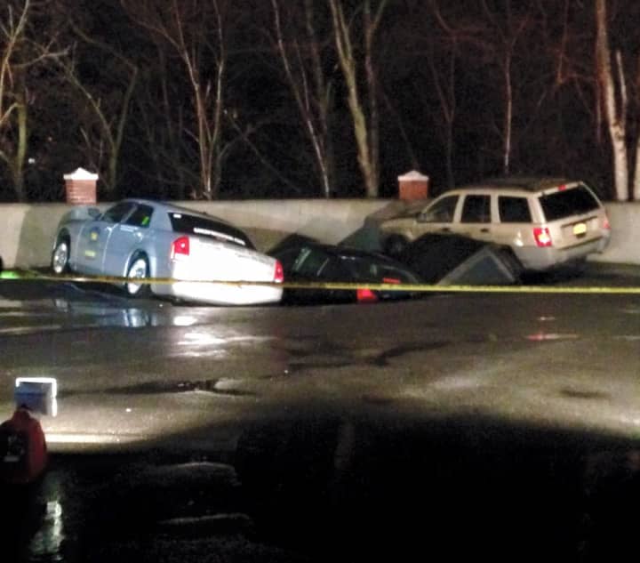 A roof collapse in Ossining impacted four cars on Tuesday night.