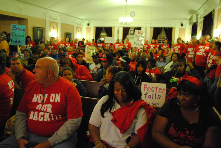 Protesters line the Peekskill Common Council chamber to oppose the proposed budget. 